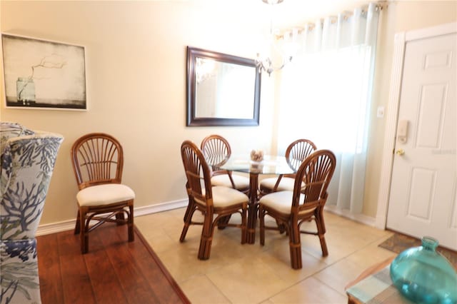 dining space featuring baseboards