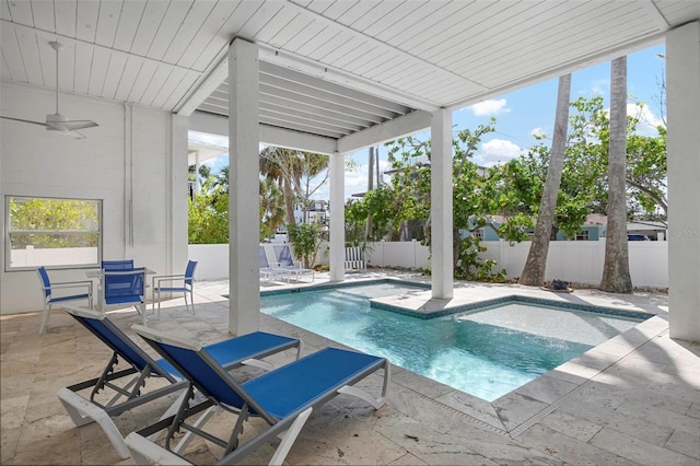 view of swimming pool featuring a patio, a fenced backyard, and ceiling fan