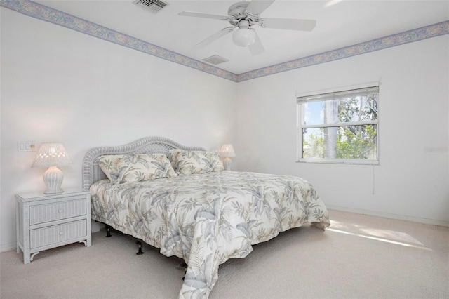 bedroom featuring carpet floors, baseboards, and ceiling fan