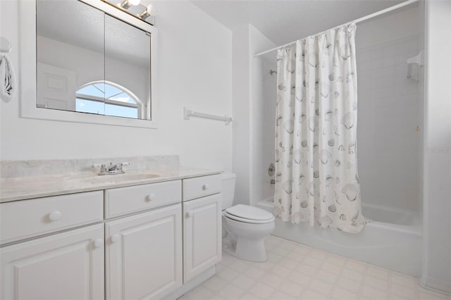 full bath with shower / bath combo, vanity, toilet, and tile patterned floors