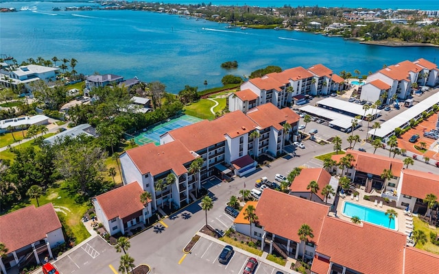 birds eye view of property featuring a water view