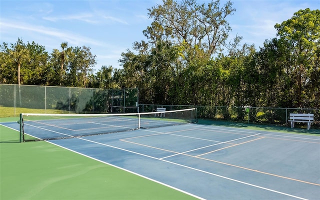 view of sport court with fence and community basketball court