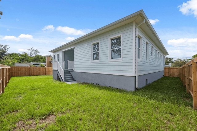 8622 Inwood Dr, Hudson, FL 34667 - back of house with a fenced backyard