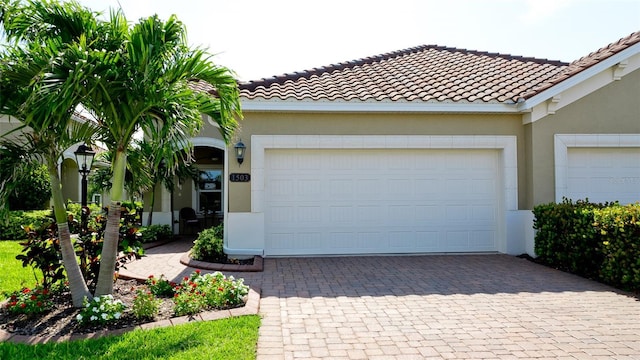 1503 Calle Grand St, Bradenton, FL 34209 - garage featuring decorative driveway
