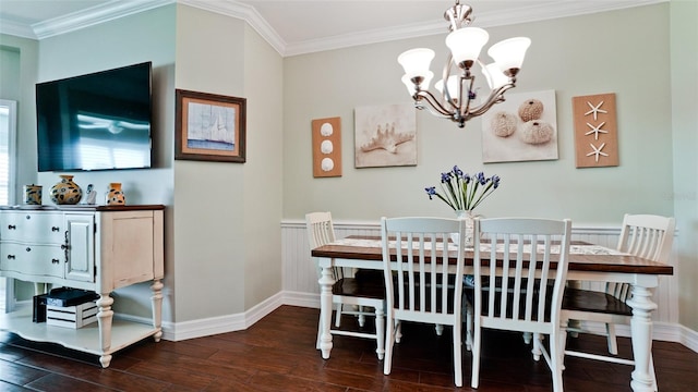 1503 Calle Grand St, Bradenton, FL 34209 - dining area with a chandelier, dark wood-style flooring, ornamental molding, and baseboards