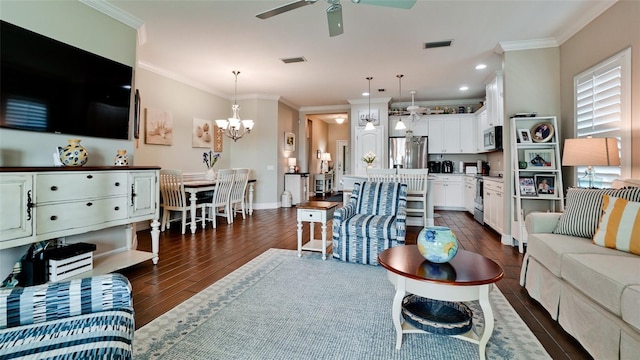 1503 Calle Grand St, Bradenton, FL 34209 - living room featuring dark wood-type flooring, ceiling fan, ornamental molding, a chandelier, and recessed lighting