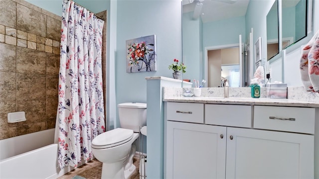 1503 Calle Grand St, Bradenton, FL 34209 - bathroom with toilet, shower / bathtub combination with curtain, vanity, and a ceiling fan