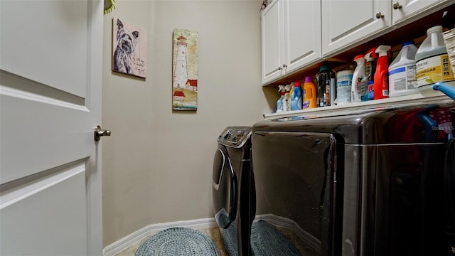 1503 Calle Grand St, Bradenton, FL 34209 - laundry room featuring washing machine and clothes dryer, cabinet space, and baseboards