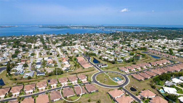 1503 Calle Grand St, Bradenton, FL 34209 - aerial view of property and surrounding area featuring nearby suburban area and a large body of water