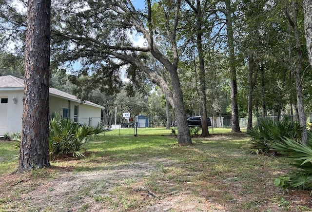 view of yard featuring fence