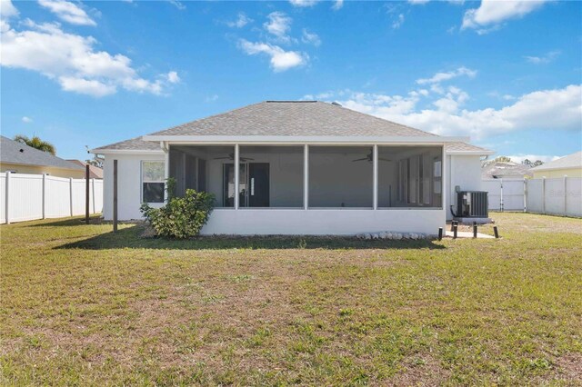 back of house featuring a sunroom, ceiling fan, central air condition unit, and stucco siding