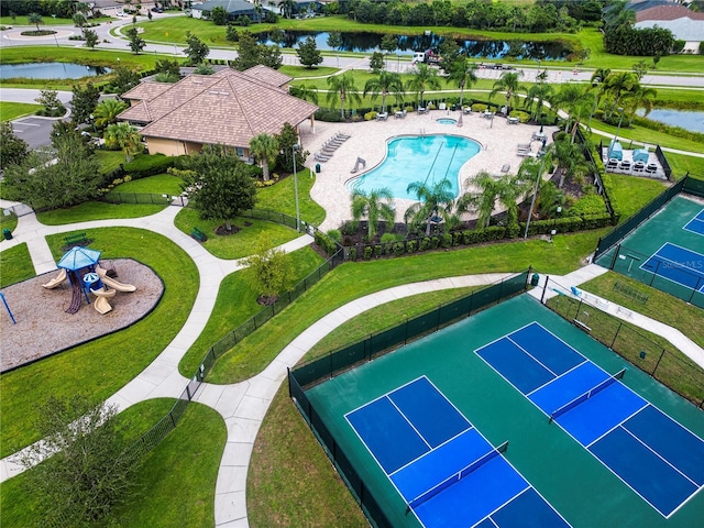 aerial view of a nearby body of water and a pool