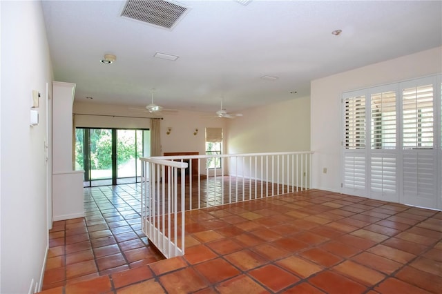 4812 Kestral Park Cir Unit 20, Sarasota, FL 34231 - unfurnished room featuring ceiling fan, tile patterned floors, and visible vents