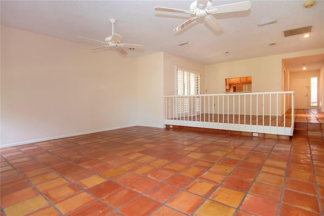 4812 Kestral Park Cir Unit 20, Sarasota, FL 34231 - tiled empty room with baseboards, a ceiling fan, and visible vents