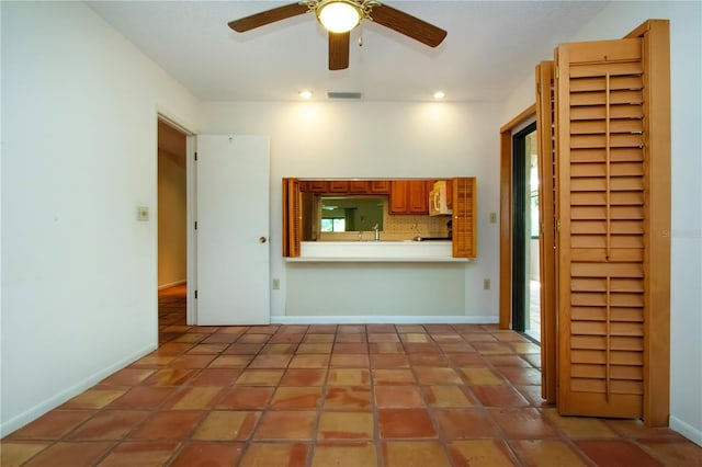 4812 Kestral Park Cir Unit 20, Sarasota, FL 34231 - unfurnished living room with baseboards, a ceiling fan, visible vents, and recessed lighting