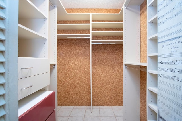 4812 Kestral Park Cir Unit 20, Sarasota, FL 34231 - spacious closet with light tile patterned floors