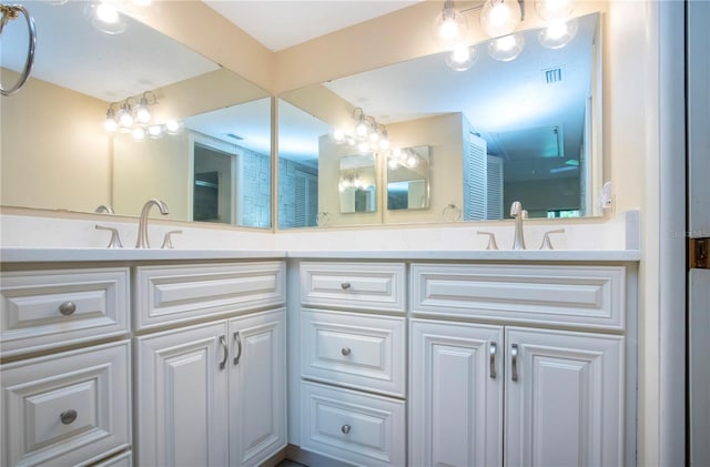 4812 Kestral Park Cir Unit 20, Sarasota, FL 34231 - full bath featuring visible vents, double vanity, and a sink
