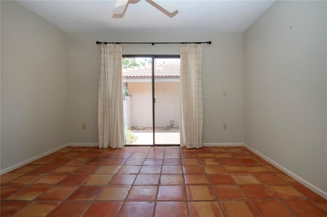 4812 Kestral Park Cir Unit 20, Sarasota, FL 34231 - unfurnished room with ceiling fan, baseboards, and tile patterned flooring