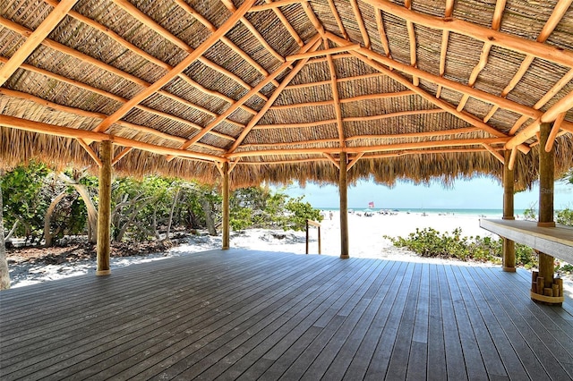 20 Whispering Sands Dr Unit 1201, Sarasota, FL 34242 - wooden terrace with a gazebo and view of water and beach