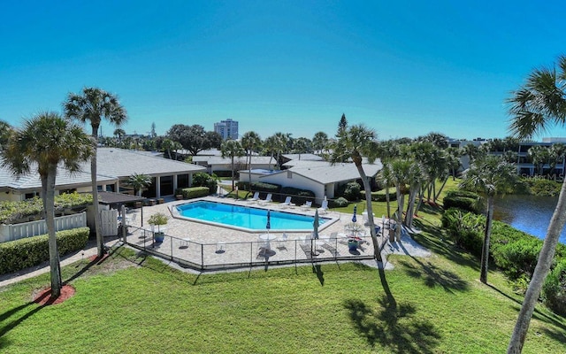 20 Whispering Sands Dr Unit 1201, Sarasota, FL 34242 - community pool featuring a patio