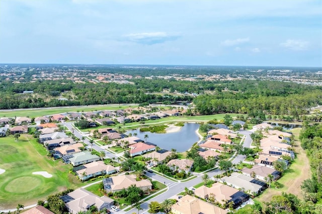 1311 Tuscany Blvd, Venice, FL 34292 - view of property location with a large body of water, nearby suburban area, a golf club, and a tree filled landscape