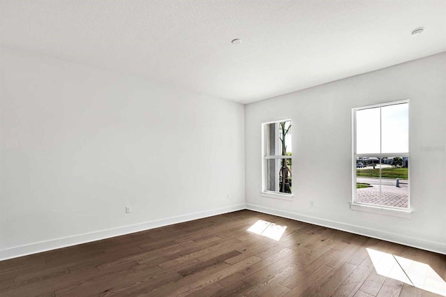 17927 Palmiste Dr, Bradenton, FL 34202 - unfurnished room with dark wood-style floors and baseboards