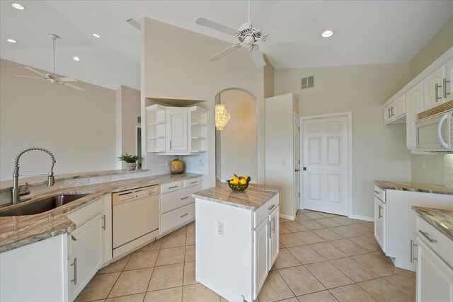 kitchen featuring white appliances, visible vents, ceiling fan, a sink, and open shelves