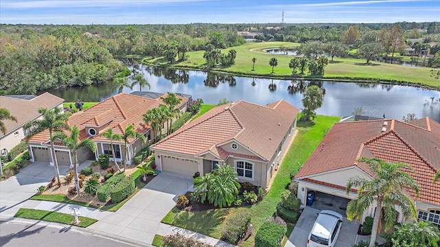 aerial view featuring a water view and a residential view