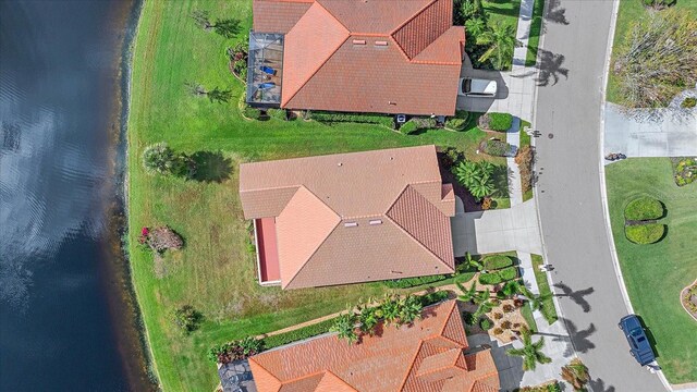 bird's eye view with a water view