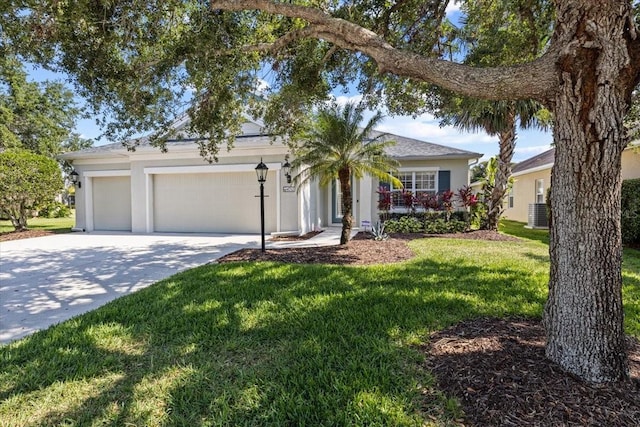 view of front of house with concrete driveway, a front yard, stucco siding, and a garage