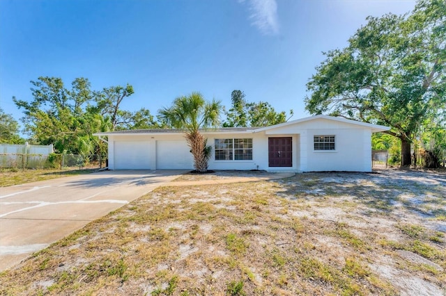 4907 4th Avenue Cir NW, Bradenton, FL 34209 - ranch-style home featuring concrete driveway, a garage, and fence