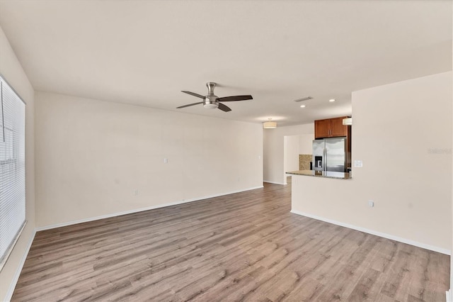 4907 4th Avenue Cir NW, Bradenton, FL 34209 - unfurnished living room featuring ceiling fan, recessed lighting, visible vents, and light wood-type flooring