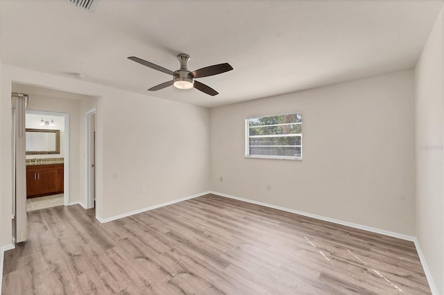 4907 4th Avenue Cir NW, Bradenton, FL 34209 - empty room with baseboards, light wood finished floors, ceiling fan, and visible vents