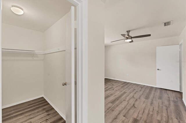 4907 4th Avenue Cir NW, Bradenton, FL 34209 - interior space with visible vents, wood finished floors, and a ceiling fan