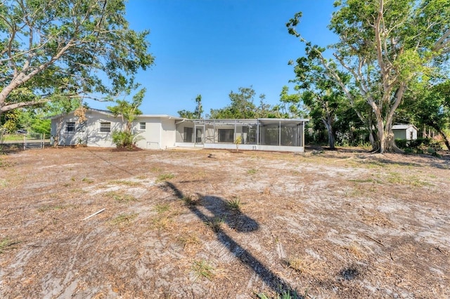 4907 4th Avenue Cir NW, Bradenton, FL 34209 - rear view of house with a sunroom