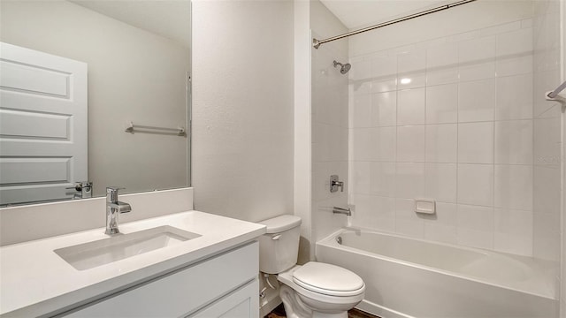 bathroom featuring vanity, toilet, and shower / tub combination