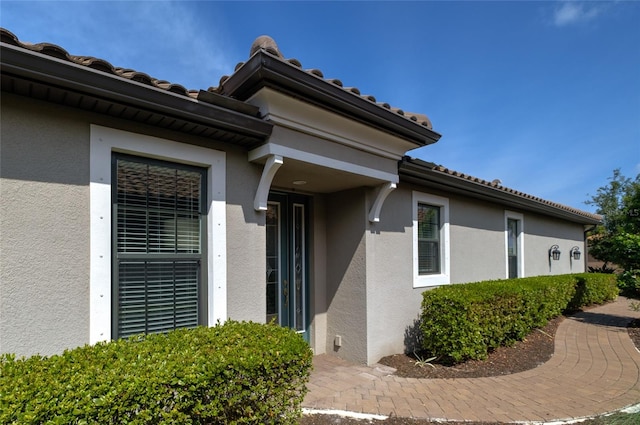 5301 Bartolomeo St, Sarasota, FL 34238 - view of exterior entry with stucco siding