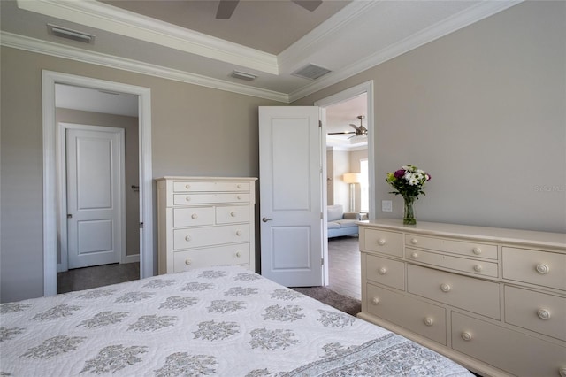 5301 Bartolomeo St, Sarasota, FL 34238 - bedroom featuring crown molding, a tray ceiling, ceiling fan, and dark carpet