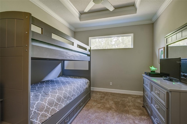 5301 Bartolomeo St, Sarasota, FL 34238 - bedroom featuring a raised ceiling, crown molding, dark carpet, a textured ceiling, and ceiling fan