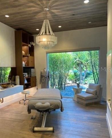 5301 Bartolomeo St, Sarasota, FL 34238 - sitting room featuring plenty of natural light, recessed lighting, wood finished floors, and wood ceiling