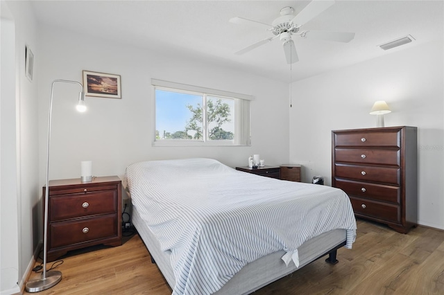 3105 Gulfgate Dr, Sarasota, FL 34231 - bedroom featuring light wood-style floors and ceiling fan