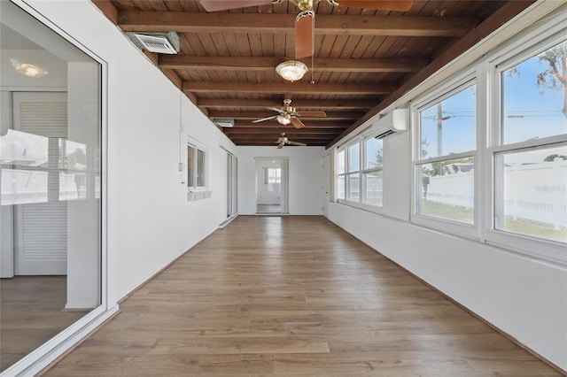 3105 Gulfgate Dr, Sarasota, FL 34231 - hall featuring an AC wall unit, wood ceiling with exposed beams, and light wood-style flooring