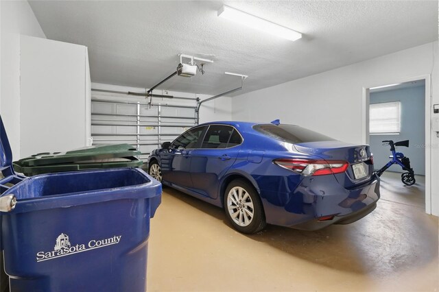 3105 Gulfgate Dr, Sarasota, FL 34231 - garage with a garage door opener