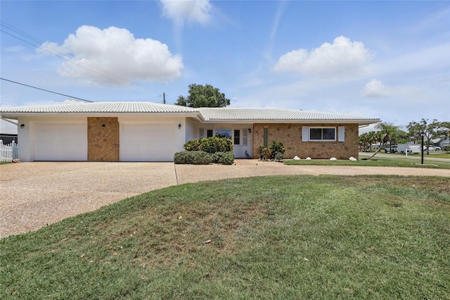 3105 Gulfgate Dr, Sarasota, FL 34231 - single story home with an attached garage, driveway, and a front yard