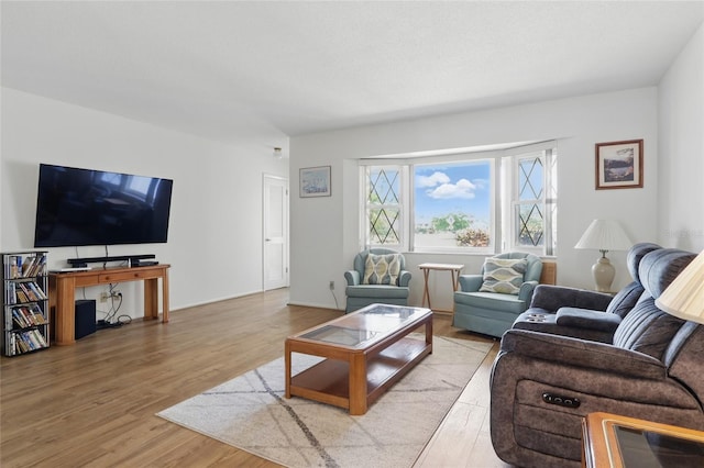 3105 Gulfgate Dr, Sarasota, FL 34231 - living area with light wood finished floors