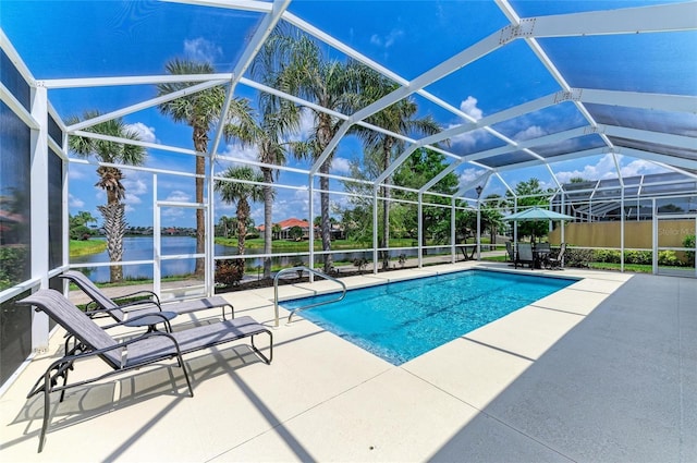 13167 Fernando St, Venice, FL 34293 - outdoor pool with a patio area, a water view, and glass enclosure