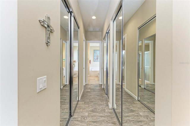 13167 Fernando St, Venice, FL 34293 - hallway with recessed lighting