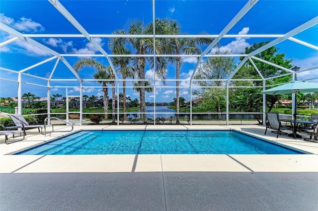 13167 Fernando St, Venice, FL 34293 - swimming pool with a patio, a water view, and a lanai