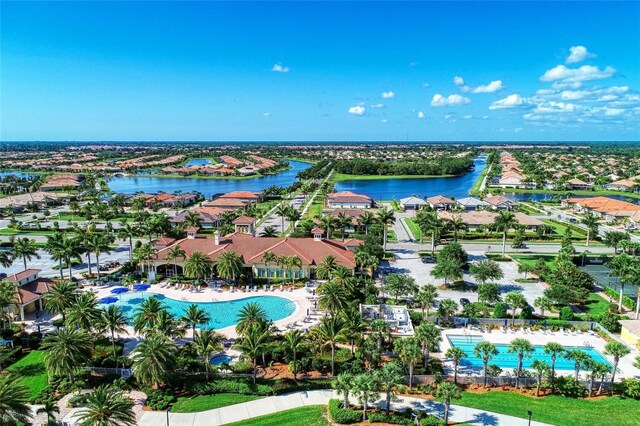 13167 Fernando St, Venice, FL 34293 - aerial view of residential area with a nearby body of water and a pool area
