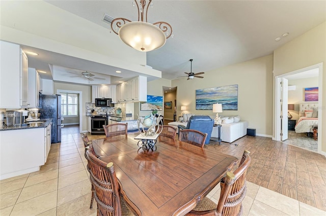 13167 Fernando St, Venice, FL 34293 - dining space with ceiling fan and light tile patterned flooring